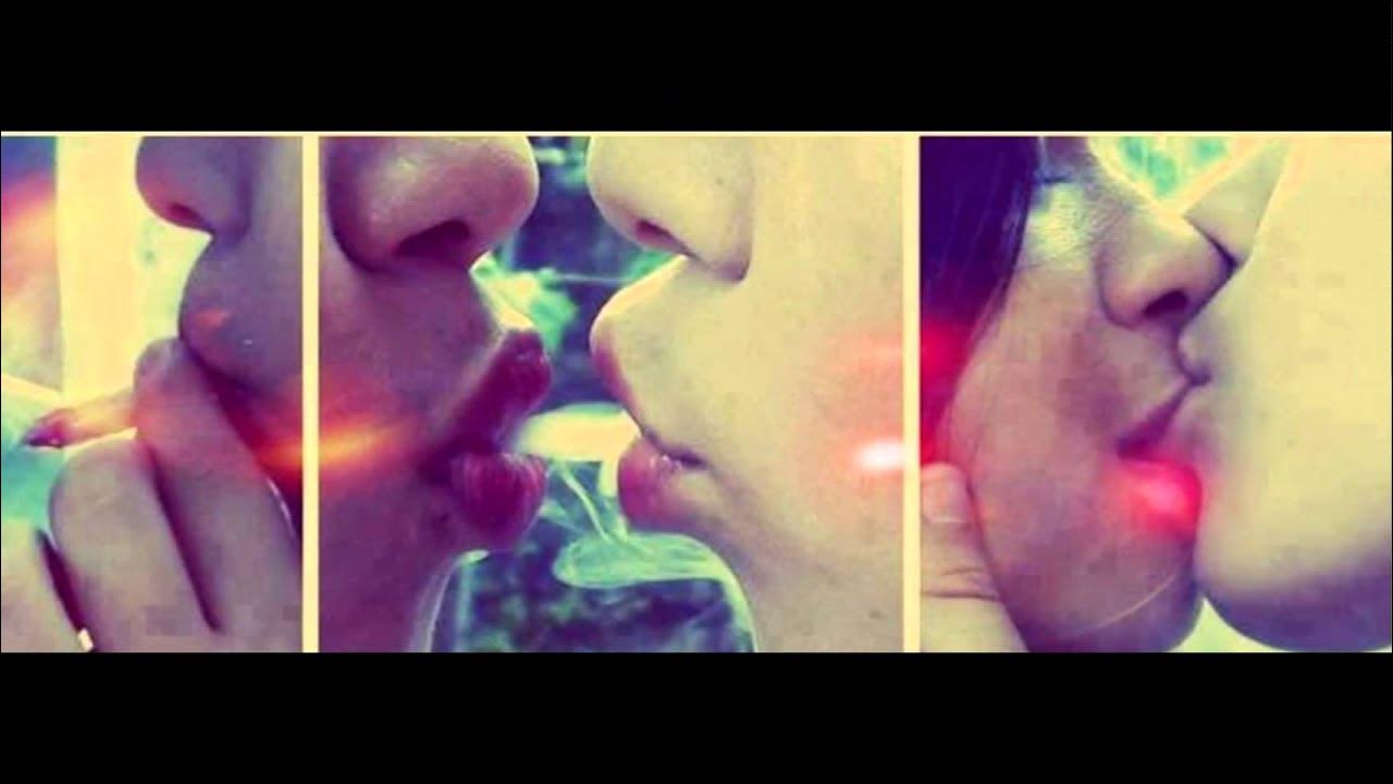 цыганка с вейпом. дым изо рта. дым через поцелуй. дым изо рта. поцелуй с сигаретным дымом.