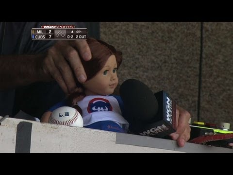 cubs-booth-not-too-old-to-play-with-dolls