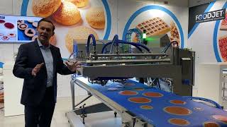 Innovative Pizza Depositing Machine: FoodJet Depositing Solutions at the IBA 2023 Exhibition
