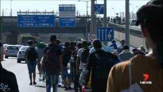 Europe opens its doors to desperate migrants