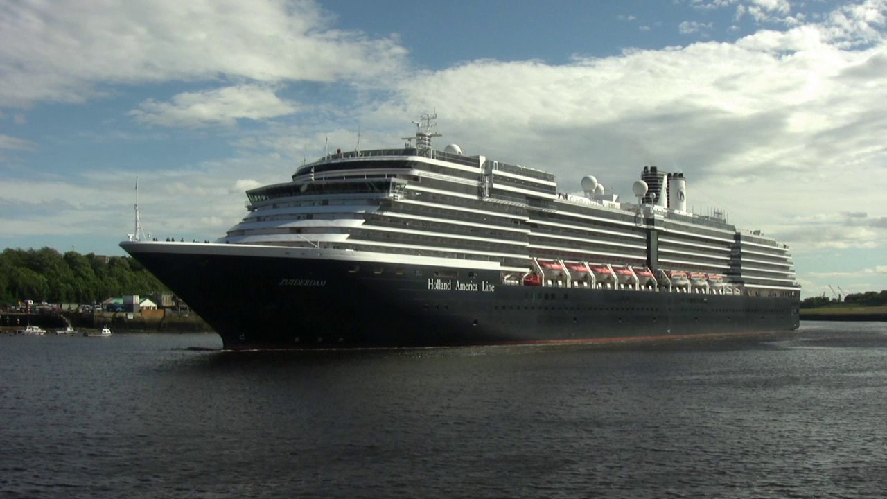 Holland America Lines Zuiderdam and DFDS Princess Seaways leave the