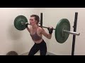 Milla Jovovich lifts a barbell