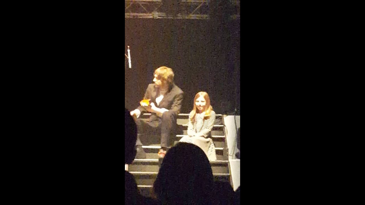 Shane Filan singing 'Fool Again' with his kids on stage in Birmingham
