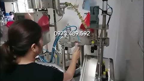 MÁY CHIẾT RÓT VÀ ĐÓNG NẮP CHAI TỰ ĐỘNG QUY MÔ NHỎ