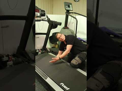 How to check for running belt and deck wear on a treadmill