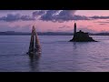 🌄 Epic sunrise drone shot of TeamWork-Team SNEF at the iconic Fastnet Rock I Course des Caps 2025