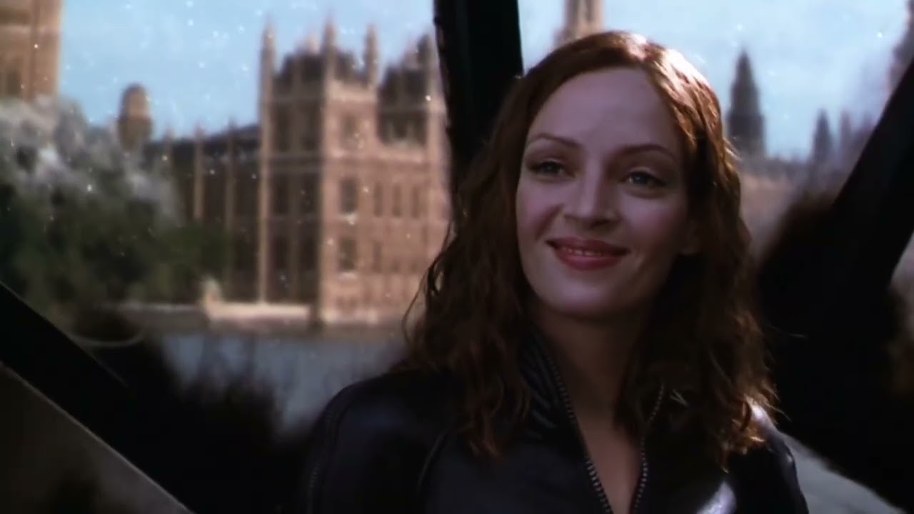 Uma thurman wearing leather catsuit kick the guy in his balls ( the avengers)