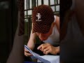 Albino reading for his exam