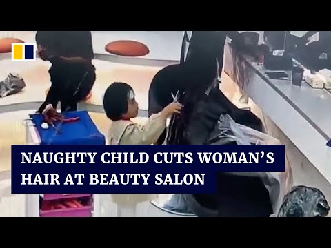Naughty child cuts woman’s hair at beauty salon in China
