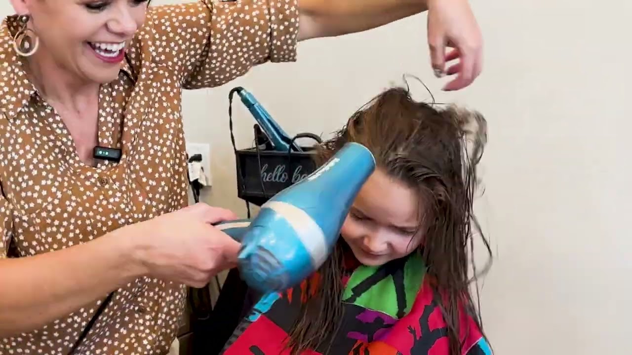 Little girl with curtain bangs after a haircut