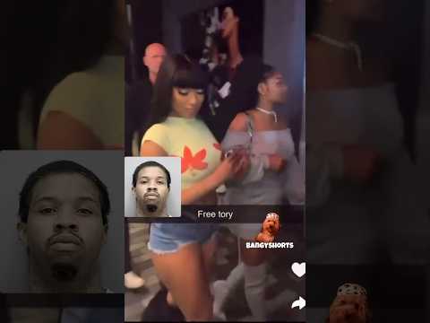 Fans shout free Tory lanez as Megan thee stallion  walks past them