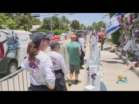 Nearly 4 Weeks Later, Surfside Memorial Grows; 96th Victim Identified