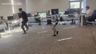 Robot kicks human