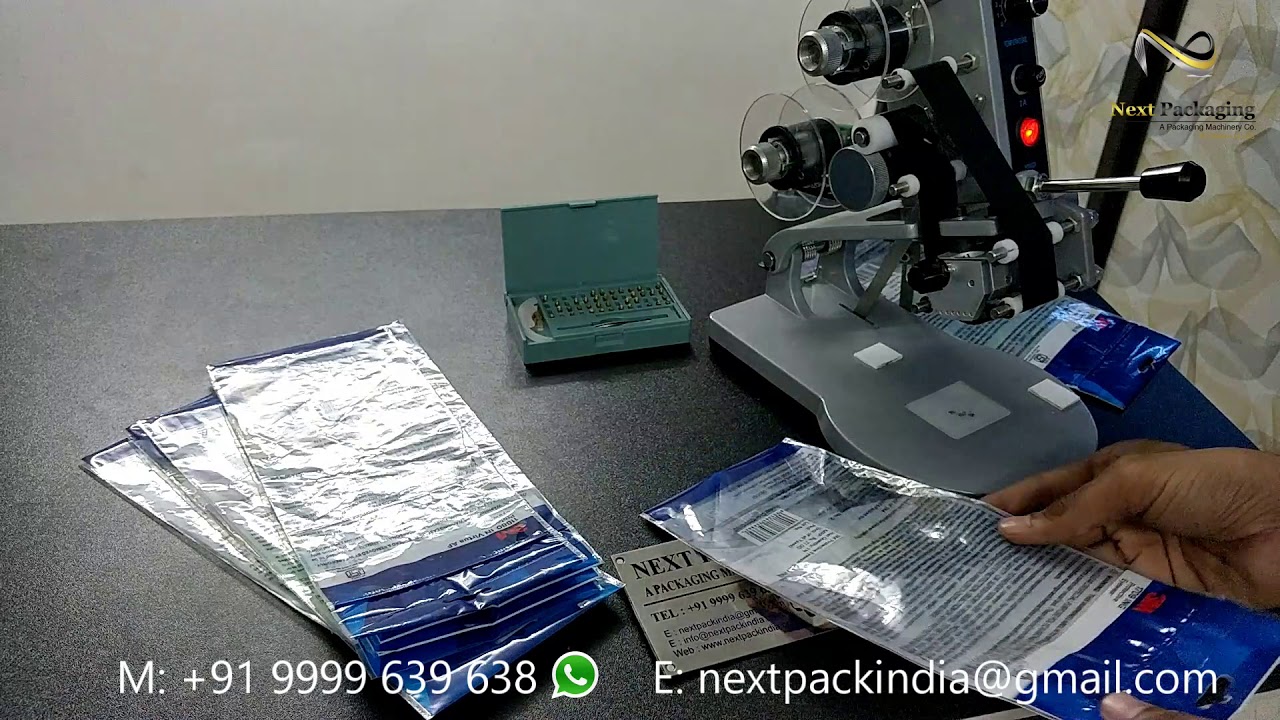 Manual Ribbon coding machine on pouch - YouTube