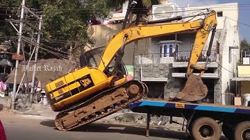 JCB Excavator Unload Off of Truck without Ramps