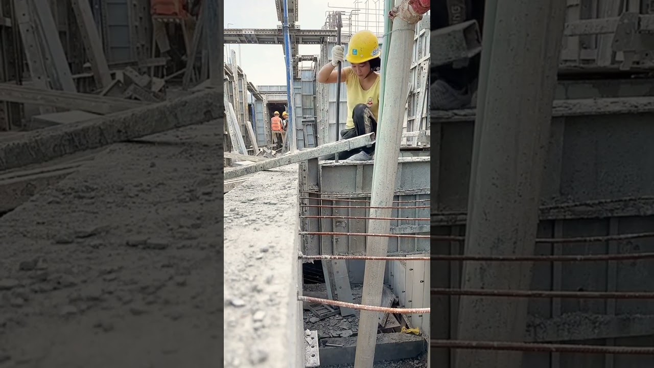 the process of removing formwork from hardened concrete at a construction site