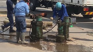 【明治用水頭首工】旧安永川の土のう袋 右岸取水口給水ポンプ、ホース撤去