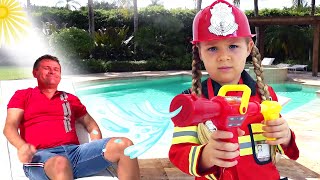 Dina pretends to be a fireman and helps her dad