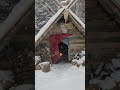 cozy fire during winter storm in my bushcraft shelter