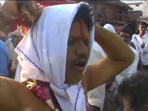Indian villagers perform body piercing ritual to cure chicken pox - YouTube