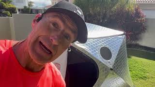 John G setting up a ShiftPod MiniIII pop up tent - They say it only takes less than 90 seconds.