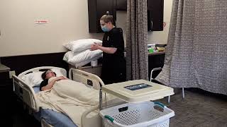 Positioning a dependent resident in Bed on side