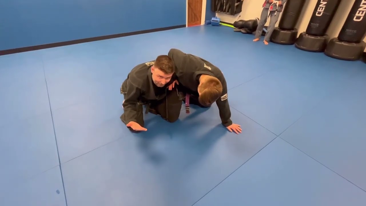 Half Guard Sweep (dogfight/knee tap)
