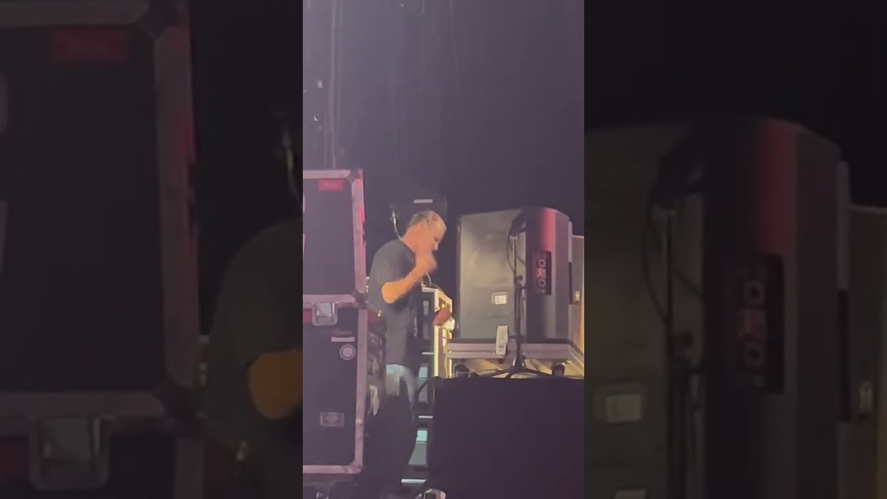 Flea from Red Hot Chili Peppers grooving sidestage watching opening act Thundercat in Toronto 2022