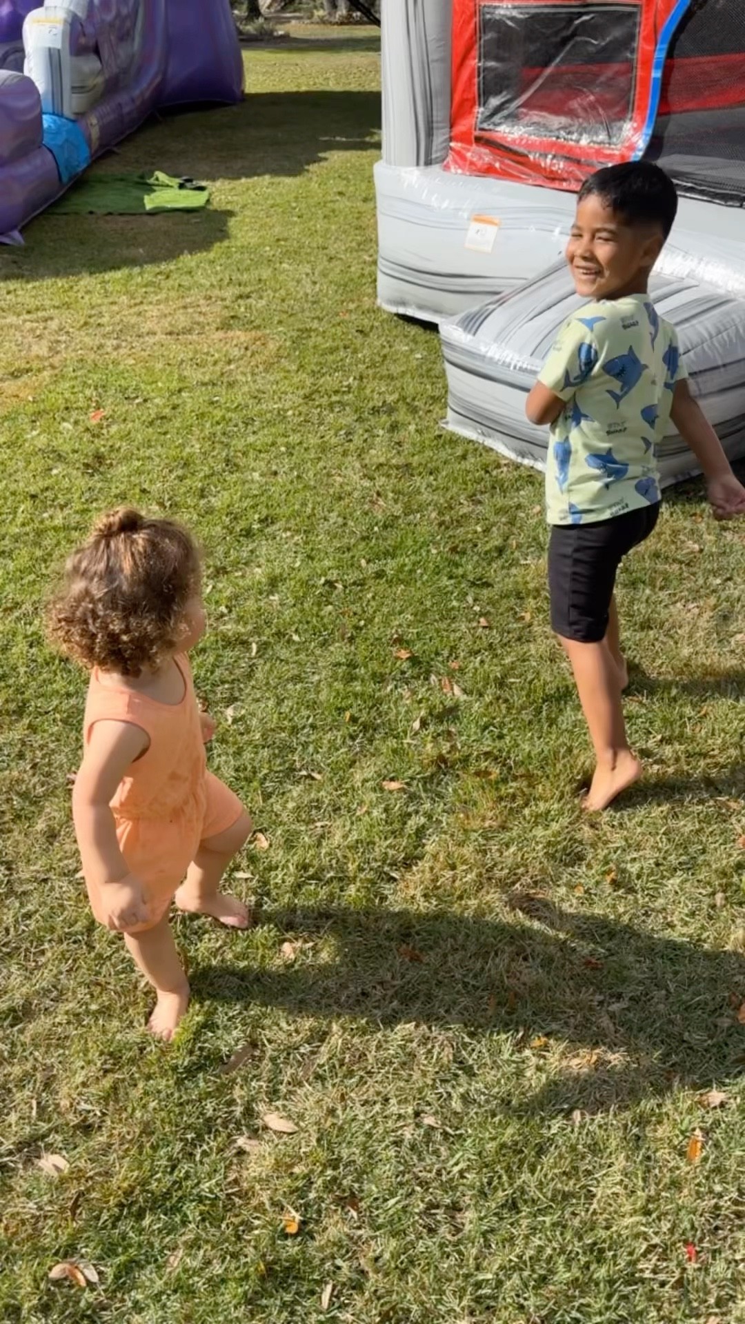 Dad catches son and daughter jumping in a bouncy house #shorts