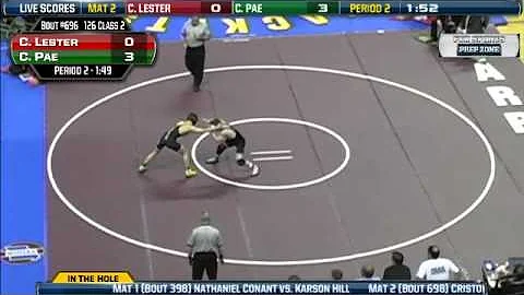 John Burroughs' Cory Lester wrestles against Fulto...
