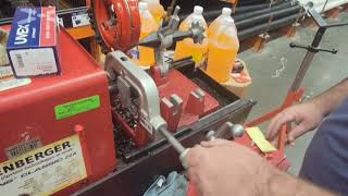 How to use a pipe threading machine