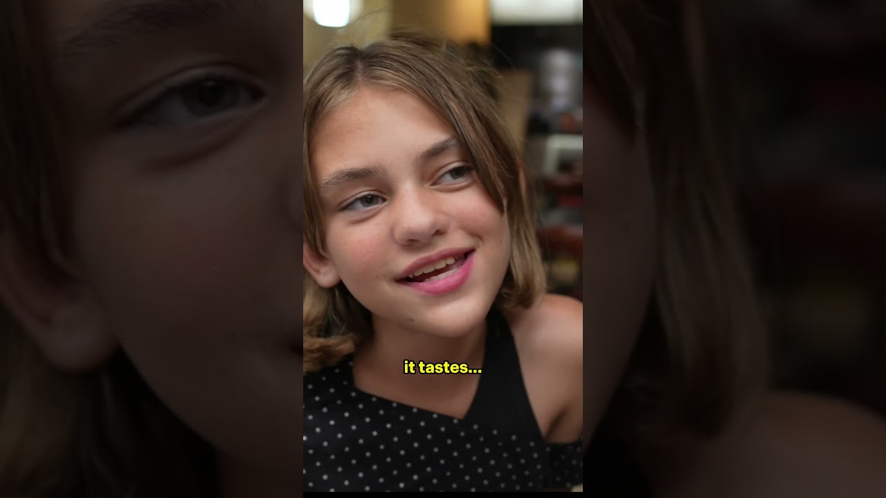 Girl trying truffle for the first time.