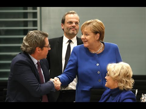Merkel: "Andy Scheuer macht eine sehr gute Arbeit" | AFP