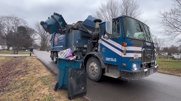 Republic Services ACX Python Collecting Heavy Post Christmas Trash