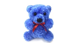 A Bear Making of pom-poms. Teddy Bear made of Wool Yarn. DIY ideas from pom-poms.