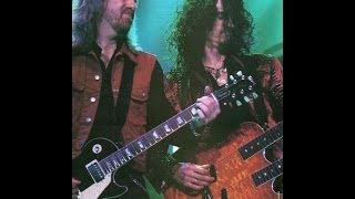 Joe Perry &amp; Brad Whitford  guitarists of Aerosmith performing  &quot; Rats in the Cellar  &quot;
