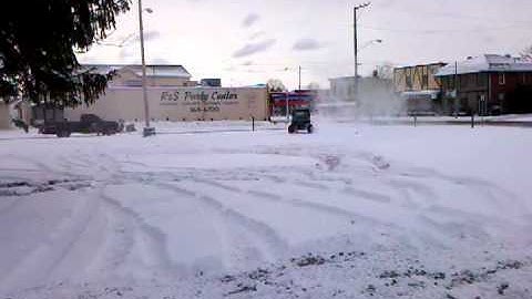 Travis Marinelli out Snow drifting in his Polaris RZR