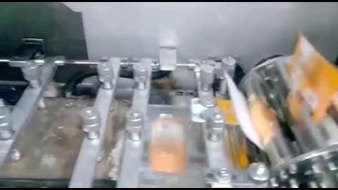 Toilet soap wrapping machine with stiffener