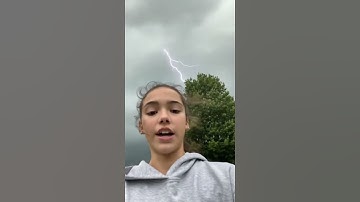 Lightning Strikes Tree Behind Girl During Selfie Video