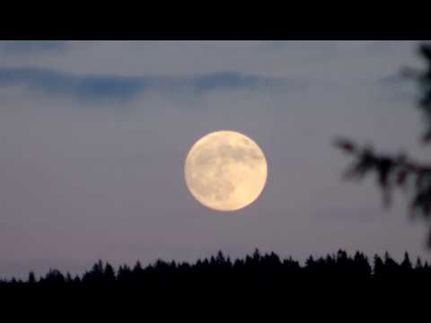 Refraction -- Total Lunar Eclipse - Moon turns a shade of red or orange