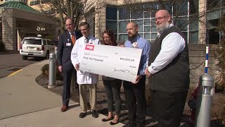Grocery store donates to children's hospital