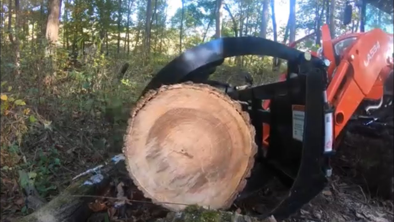 #57 Moving downed trees with the Kubota B2650 - YouTube