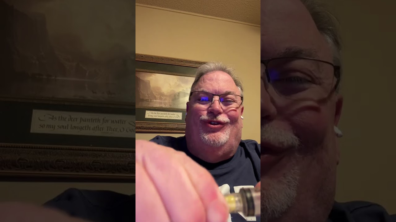 Refilling a fountain pen cartridge with bottle ink.