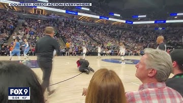 Security guard tackles another protester at Minnesota Timberwolves playoff game | FOX 9 KMSP