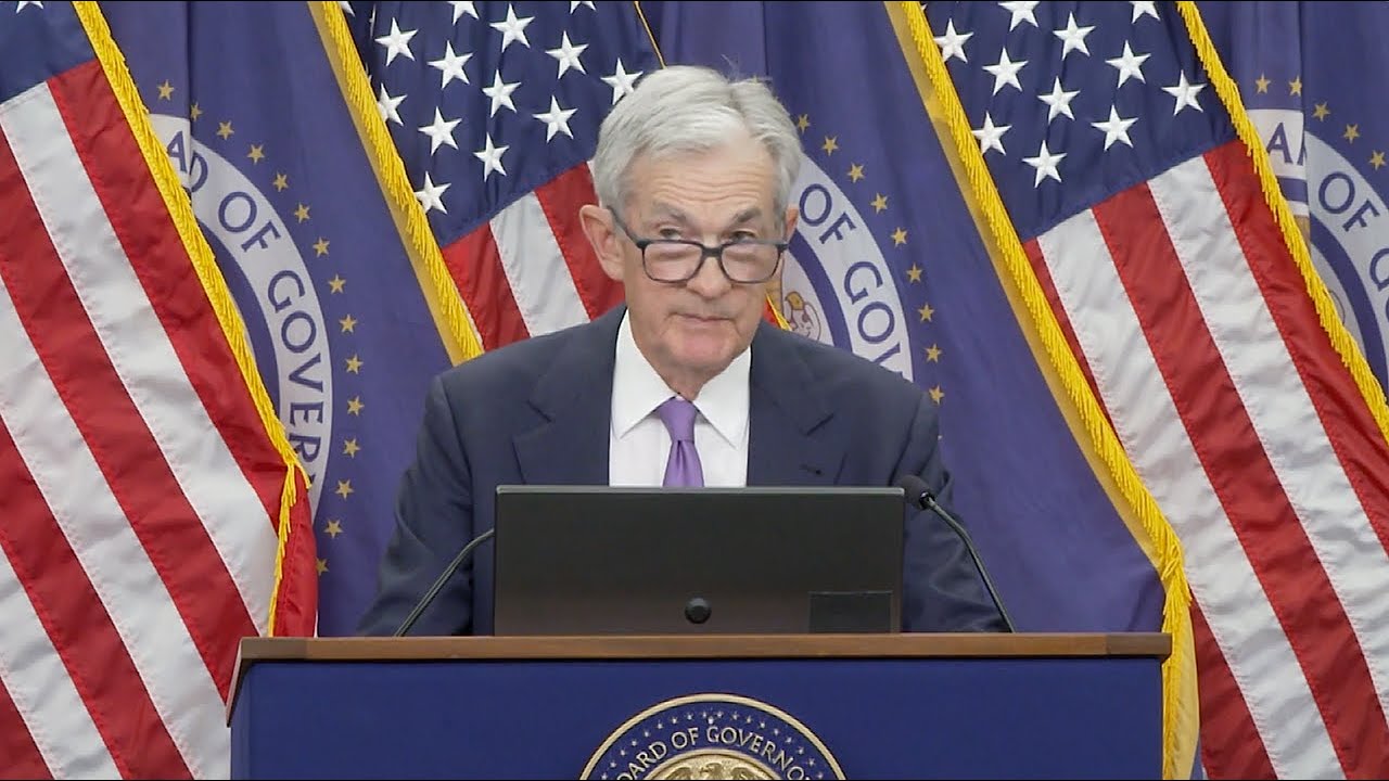 Federal Reserve cuts interest rates by quarter point - YouTube