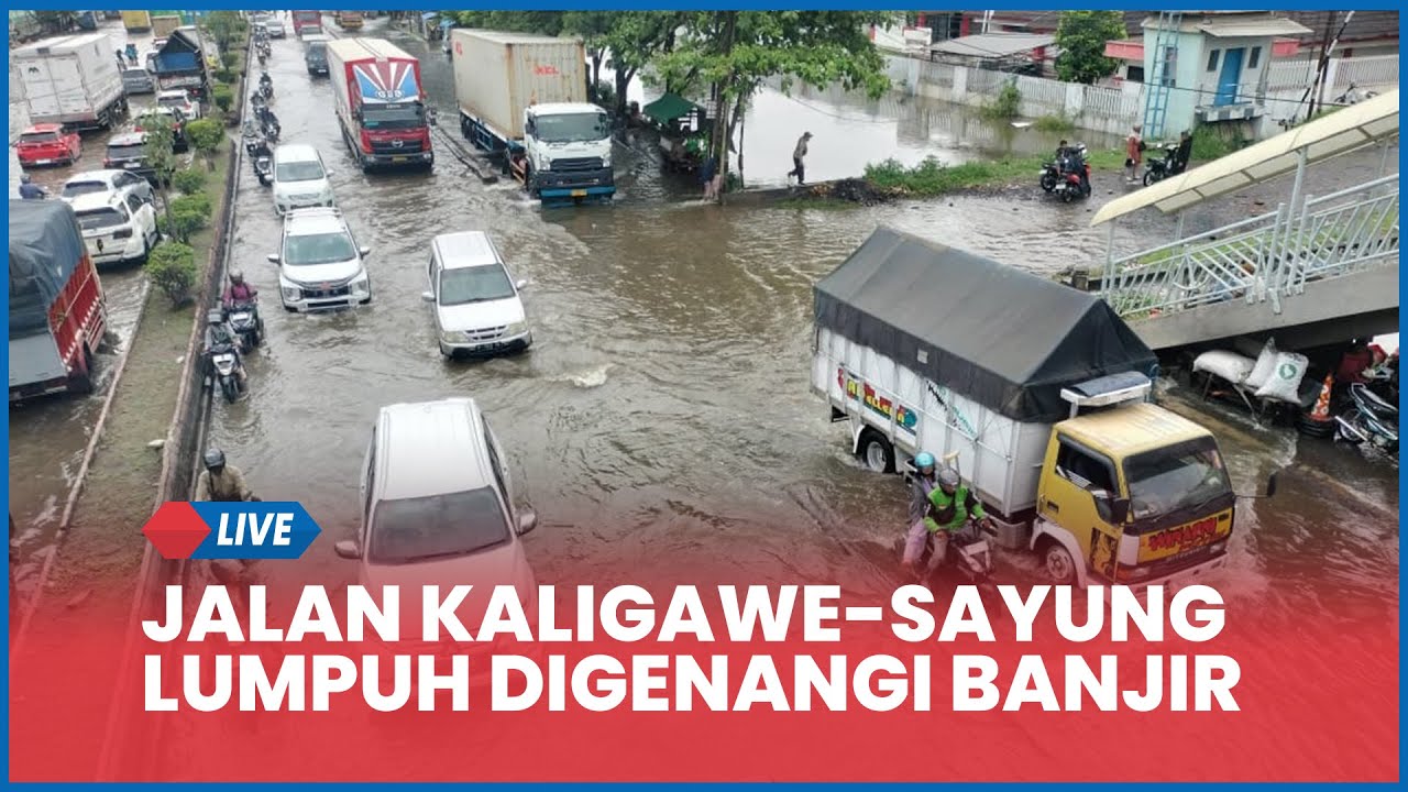 🔵 Jalur Kaligawe-Sayung Semarang Lumpuh Digenangi Banjir,Pengguna Jalan Mengeluh Aktivitas Terhambat
