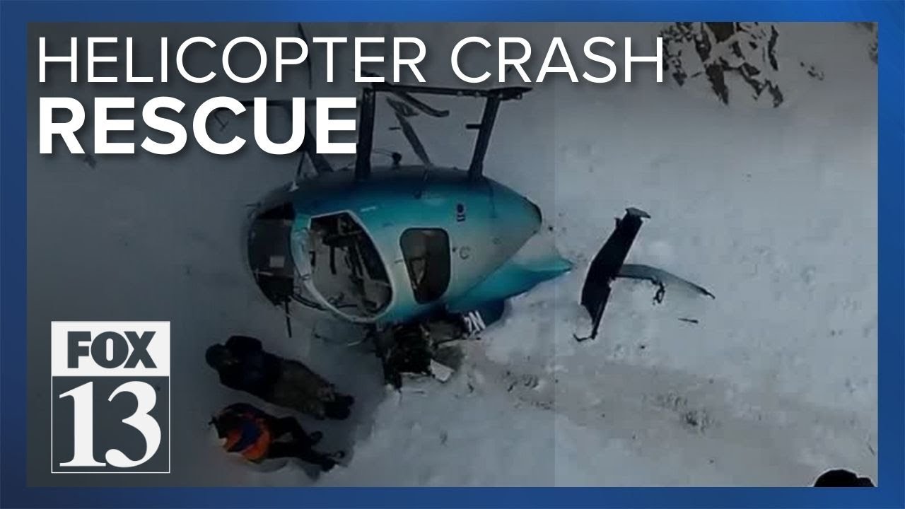 New video shows rescue of helicopter crew after crash in Utah mountains ...