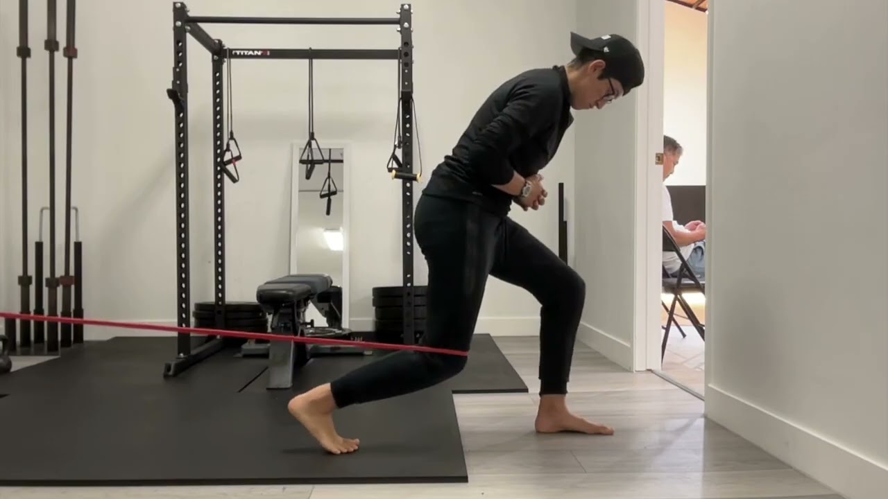 Staggered Stance Band Resisted Soleus Raise with Bent Knee