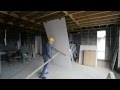 The FAST and EASY way to install a FULL SIZE sheet of plasterboard / drywall to a ceiling
