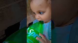 Baby Drinking Sprite